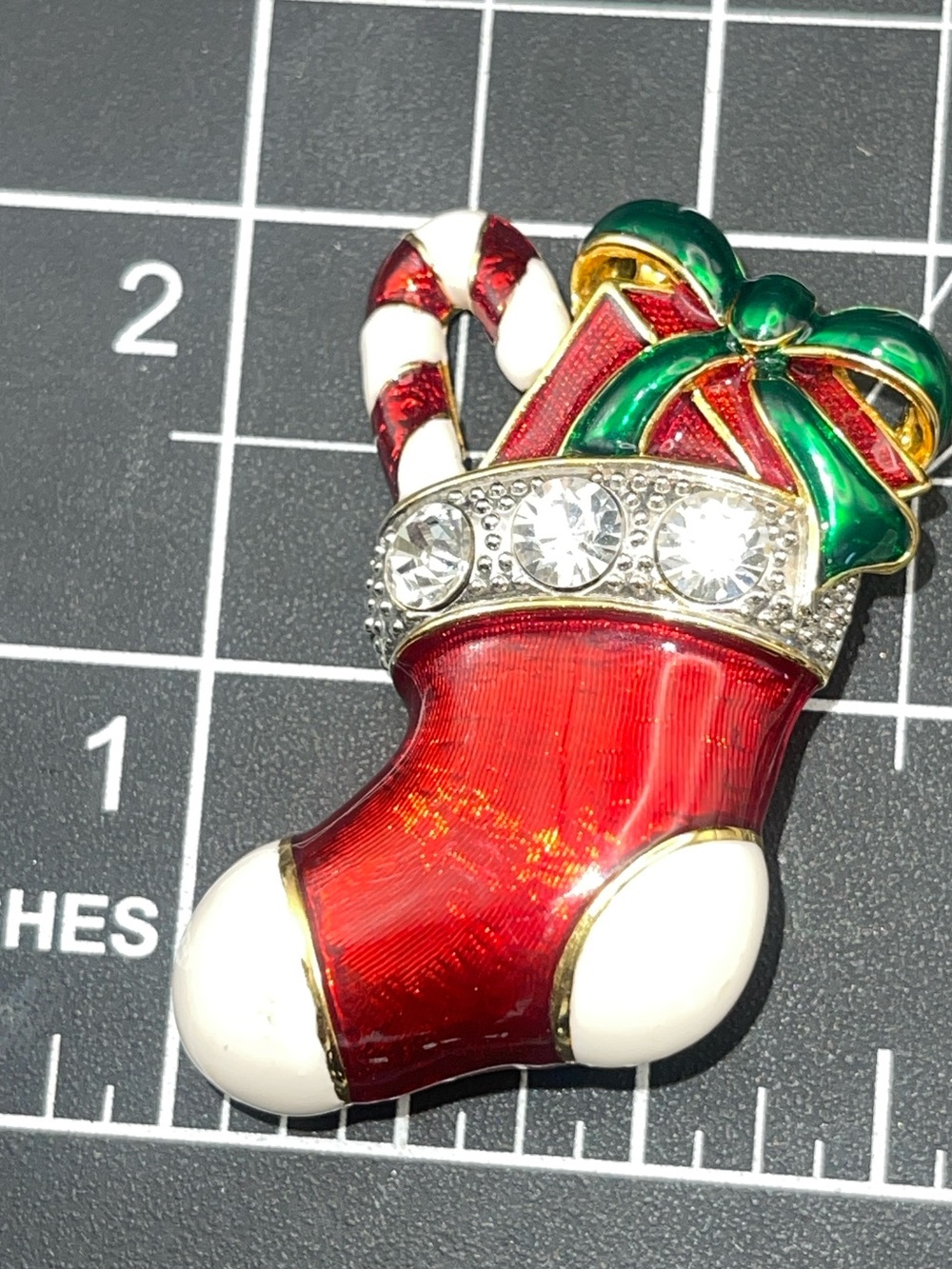 Festive Red Christmas Stocking Brooch with Green Bow